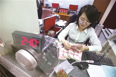 中国外汇交易中心报人民币对美元汇率中间价为6.9450